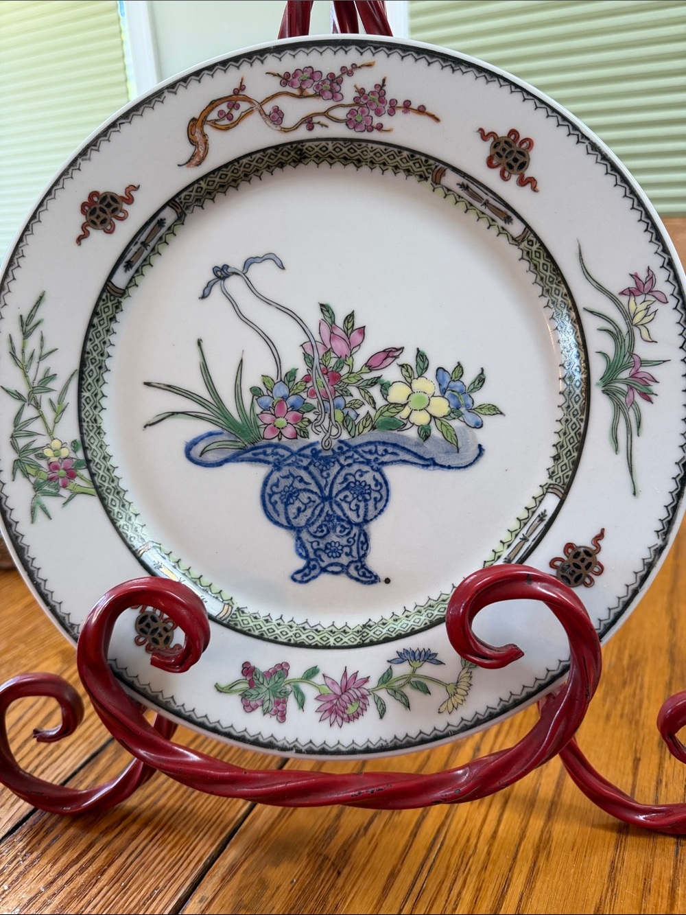Vintage  Chinoiserie decorative Hand painted  10.5” plate. Blue basket w/florals